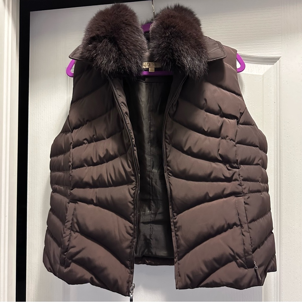 Brown winter vest with fur..